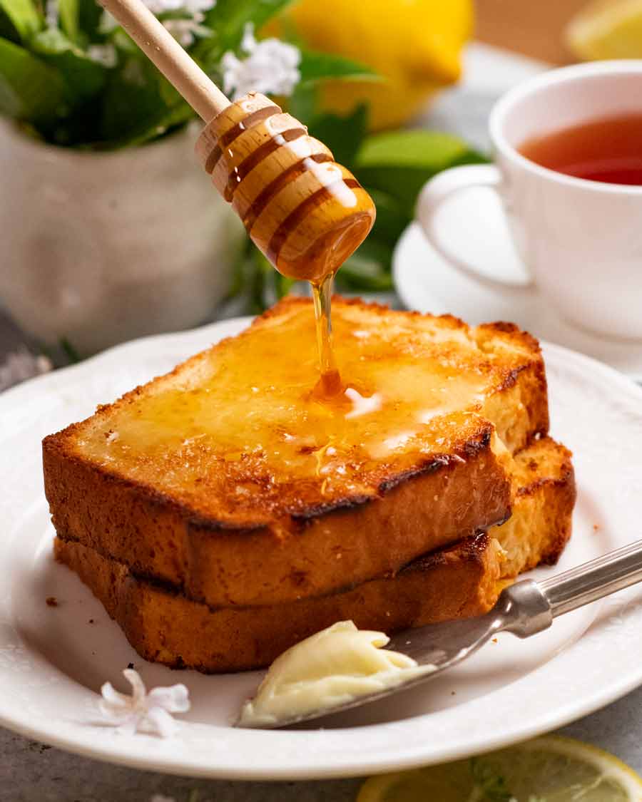 Toasted Glazed lemon loaf with butter and honey
