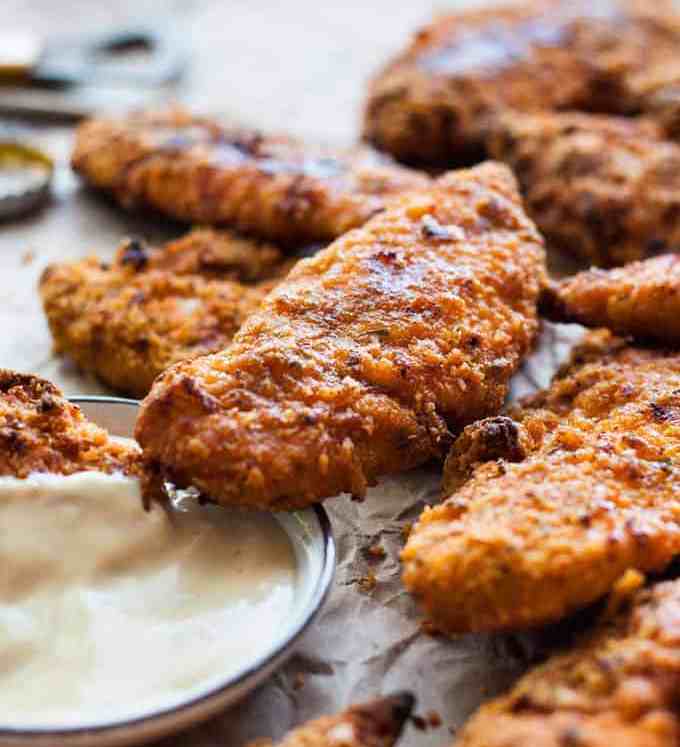 Oven Fried Chicken Tenders - tastes just like KFC, with a crunchy coating, 11 Secret Herbs & Spices and a fraction of the calories! recipetineats.com