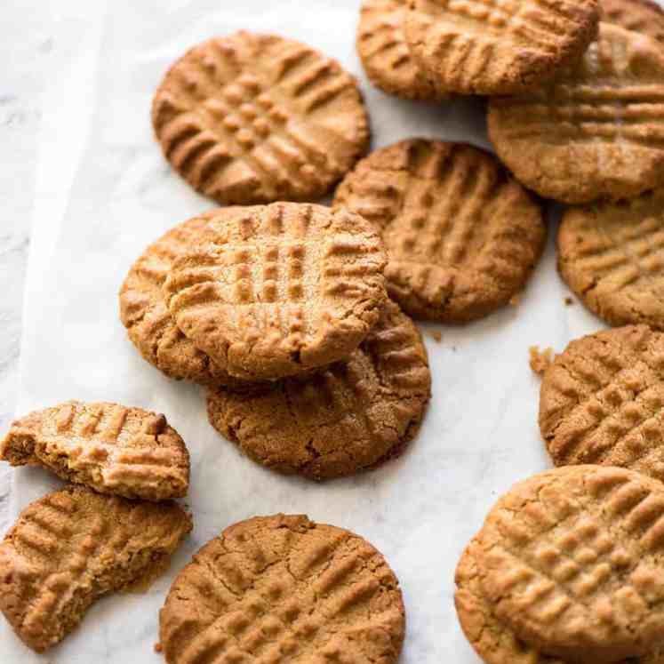 The World's Best Easy Peanut Butter Cookies are SOFT and CHEWY. Peanut butter, brown sugar and egg is all you need! recipetineats.com