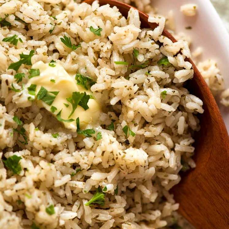 Close up of seasoned rice with butter, ready to be served (copycat boxed rice)